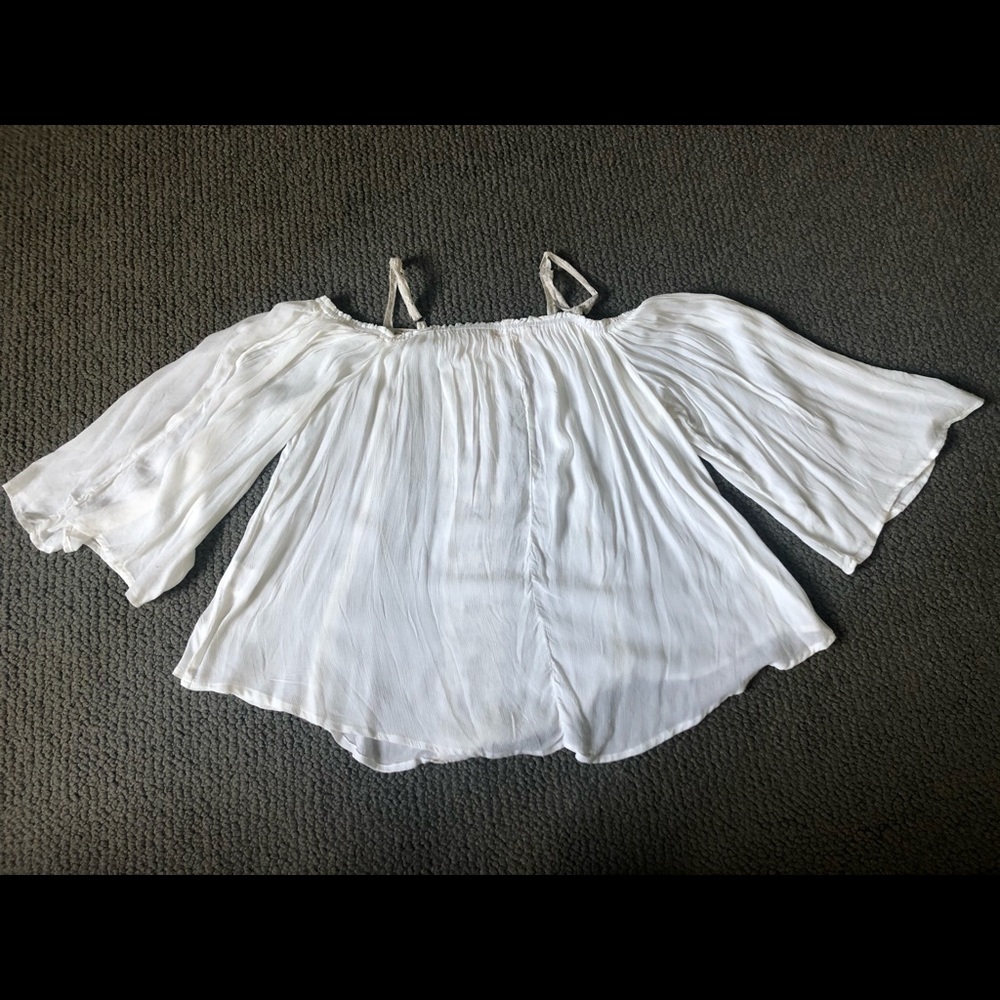 White flowy top